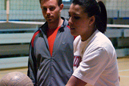 Courtney Flory demonstrates serving technique during a clinic March 14.