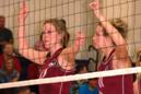 Jessica White (left) and Kristen Mahoney combined for four solo blocks against College of Mount St. Joseph.
