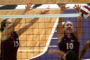 Jessica White (left), Stacie Muir and the Red Wolves beat Huntington University.