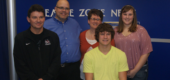 Matt Hinds (yellow shirt) will play tennis for IU East.