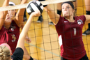 Anne Wissel (right) and Breezy Strete go high for a block.